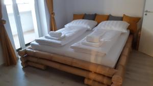 Postel nebo postele na pokoji v ubytování Apartmán Viktória