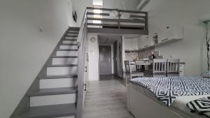 Posteľ alebo postele v izbe v ubytovaní Gyulai-fürdő-apartman II.