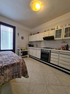 Kuchyň nebo kuchyňský kout v ubytování Villa Nice San Vito Lo Capo