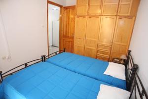 A bed or beds in a room at Afroditi Syros