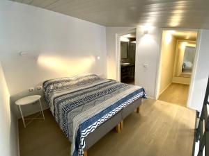 A bed or beds in a room at Studio SteBa 1