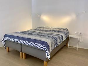 A bed or beds in a room at Studio SteBa 1
