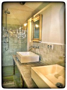 a bathroom with a sink and a shower at La Providence in Apt