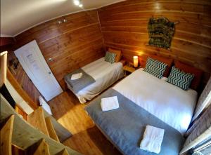 Postel nebo postele na pokoji v ubytování Hotel Andes Pucón