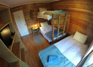 Postel nebo postele na pokoji v ubytování Hotel Andes Pucón