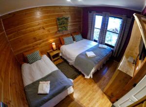 Postel nebo postele na pokoji v ubytování Hotel Andes Pucón