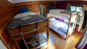 Postel nebo postele na pokoji v ubytování Hotel Andes Pucón