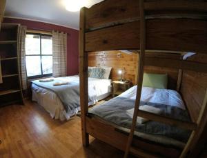 Postel nebo postele na pokoji v ubytování Hotel Andes Pucón