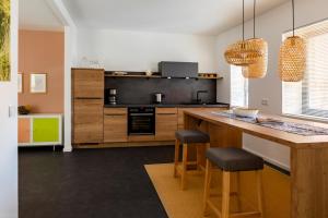Kuchyň nebo kuchyňský kout v ubytování Hotel F-RITZ