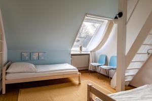 Postel nebo postele na pokoji v ubytování Hotel F-RITZ