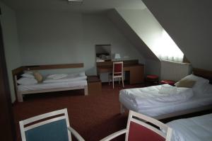 A bed or beds in a room at Szent Gellért Hostel