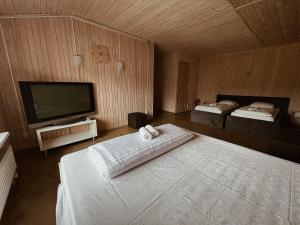 Posteľ alebo postele v izbe v ubytovaní Guest House Lviv