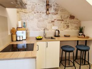 Kuchyňa alebo kuchynka v ubytovaní House Bava