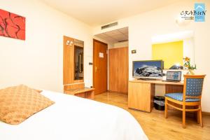 Postel nebo postele na pokoji v ubytování Crabun Hotel