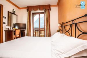 Postel nebo postele na pokoji v ubytování Crabun Hotel