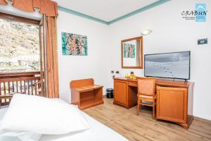 TV a/nebo společenská místnost v ubytování Crabun Hotel