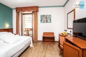 TV a/nebo společenská místnost v ubytování Crabun Hotel