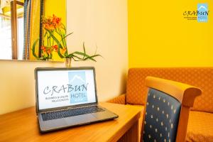 TV a/nebo společenská místnost v ubytování Crabun Hotel