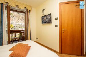 Postel nebo postele na pokoji v ubytování Crabun Hotel