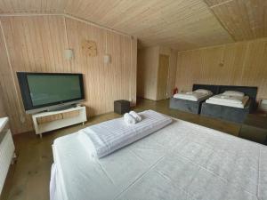 Posteľ alebo postele v izbe v ubytovaní Guest House Lviv