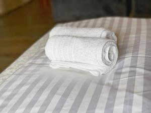 Posteľ alebo postele v izbe v ubytovaní Guest House Lviv
