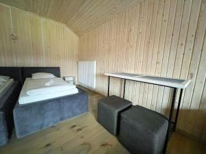 Posteľ alebo postele v izbe v ubytovaní Guest House Lviv