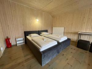 Posteľ alebo postele v izbe v ubytovaní Guest House Lviv