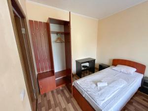 Posteľ alebo postele v izbe v ubytovaní Guest House Lviv