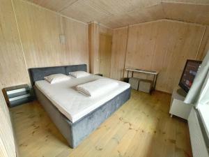Posteľ alebo postele v izbe v ubytovaní Guest House Lviv