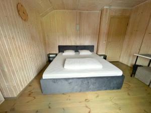 Posteľ alebo postele v izbe v ubytovaní Guest House Lviv
