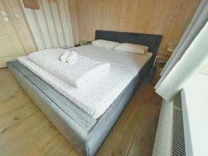 Posteľ alebo postele v izbe v ubytovaní Guest House Lviv