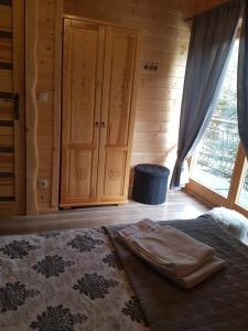 Postel nebo postele na pokoji v ubytování Tatrzańskie Domki