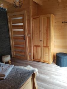 Postel nebo postele na pokoji v ubytování Tatrzańskie Domki