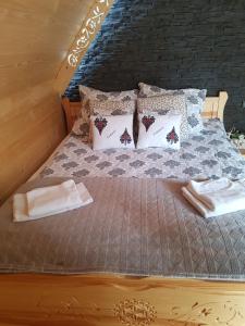 Postel nebo postele na pokoji v ubytování Tatrzańskie Domki