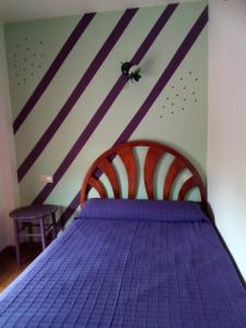 Llit o llits en una habitació de Alojamiento Monche La Loma