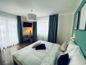 Łóżko lub łóżka w pokoju w obiekcie Haus Stadler - Self Check-in