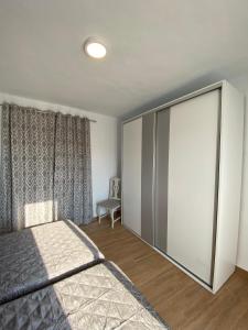 Łóżko lub łóżka w pokoju w obiekcie Casa con vistas 2