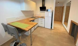 Kuchyňa alebo kuchynka v ubytovaní Apartaments l'Escala Centre