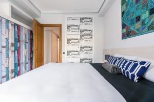 Posteľ alebo postele v izbe v ubytovaní Zurriola Surf