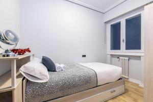 Posteľ alebo postele v izbe v ubytovaní Zurriola Surf