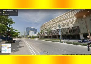 an empty street in front of a large building at Lafayette Park Square,Iloilo Business Park Condo P in Iloilo City