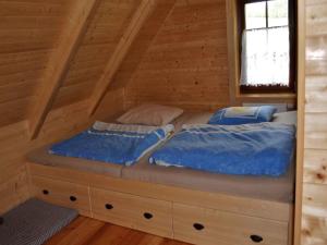 Postel nebo postele na pokoji v ubytování Holiday home in Rudnik u Vrchlabi 35456