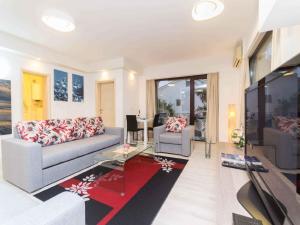 Televízia a/alebo spoločenská miestnosť v ubytovaní Apartment in Njivice/Insel Krk 33553