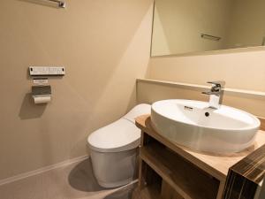 Koupelna v ubytování APA Hotel Keikyukamata Ekimae + 37 fotografií