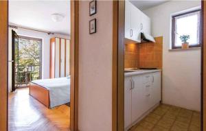 Kuchyňa alebo kuchynka v ubytovaní Apartment in Rovinj - Istrien 11802