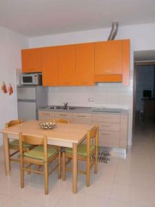 Кухня или кухненски бокс в Apartment in Bibione 24632