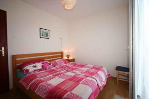 Postel nebo postele na pokoji v ubytování Apartment in Silo - Insel Krk 14461
