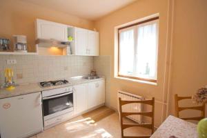 Køkken eller tekøkken på Apartment in Porec/Istrien 10034