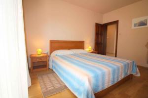 En eller flere senge i et værelse på Apartment in Porec/Istrien 10034