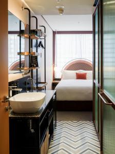 Postel nebo postele na pokoji v ubytování Ovolo South Yarra